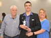 CAREERS Client Alex Barton (center) with his mother at grandfather received a Personal Achievement Award at the Anniversary Celebration